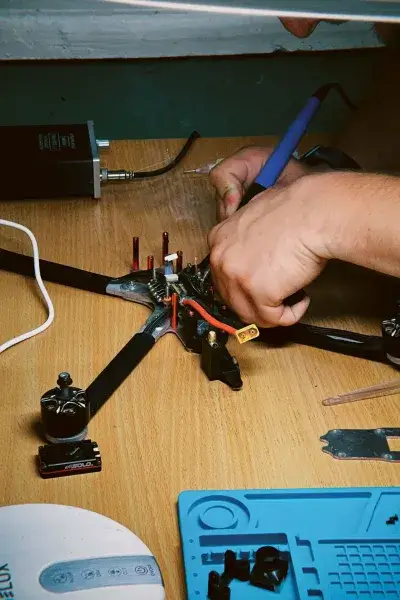 Technician repairing a drone